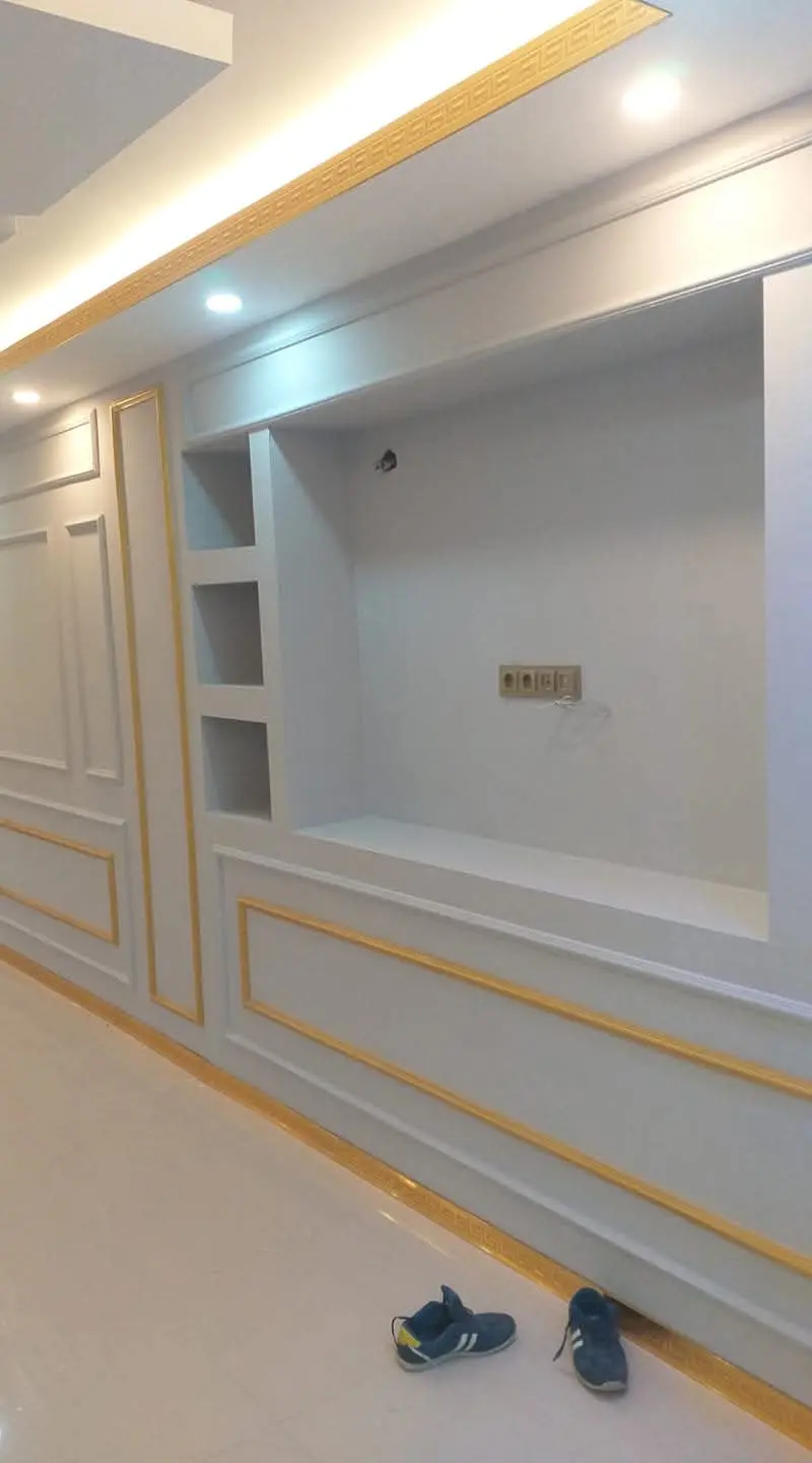 Dekoratif alçıpan bölme duvar ve TV ünitesi